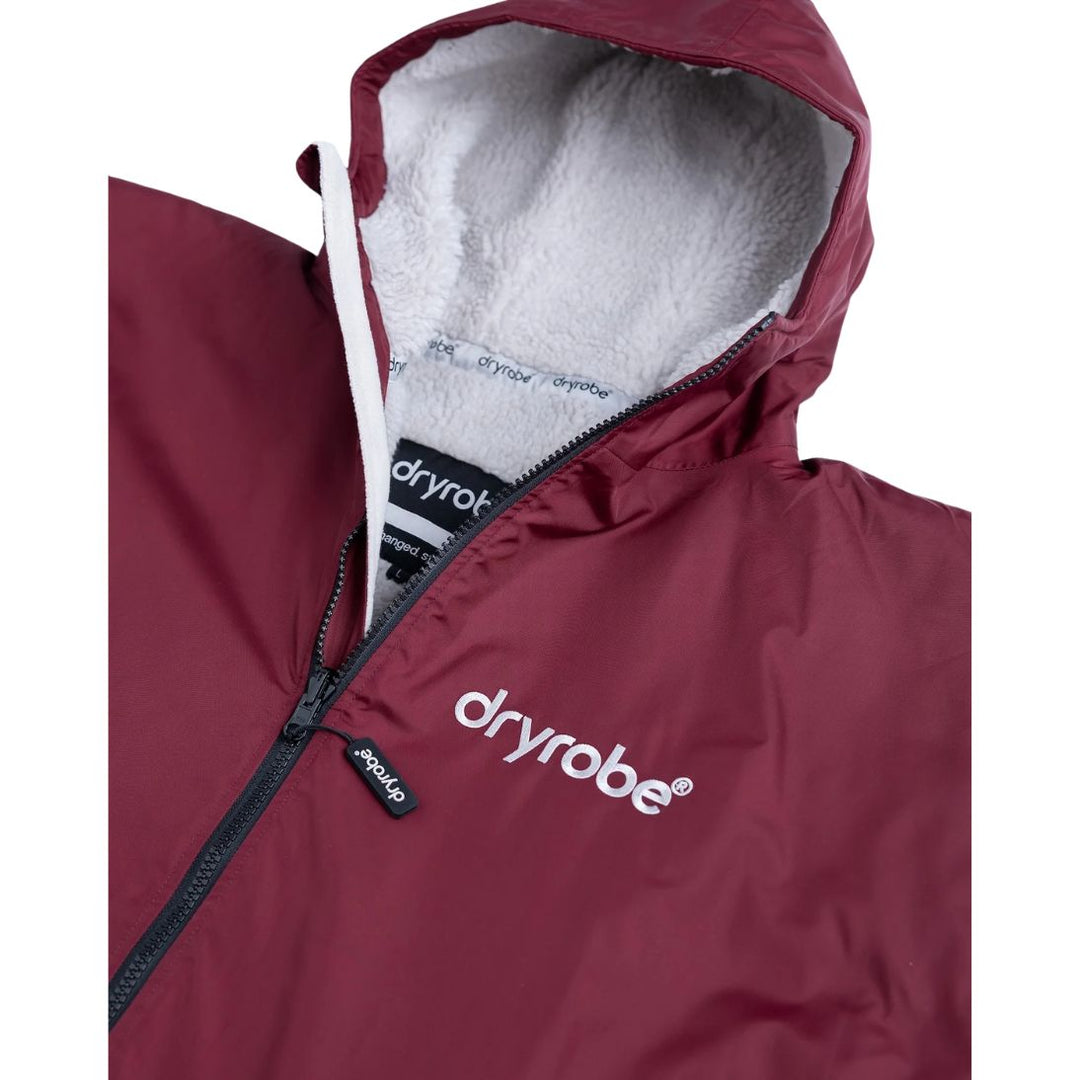 Maroon dryrobe jacket with gray lining on a white background