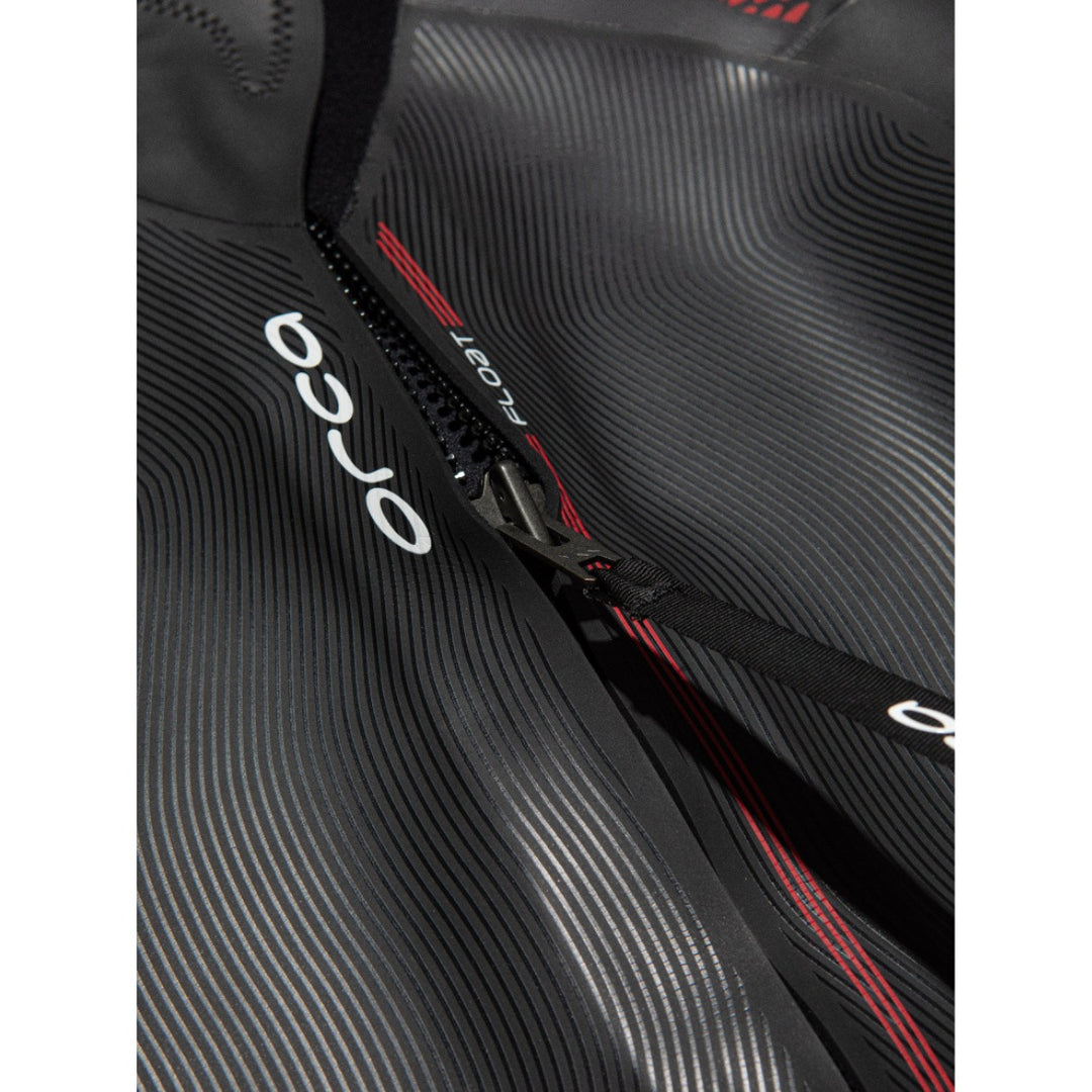 A black Orca Athlex Float V2 Triathlon Swimming Mens Wetsuit with red detailing on the sleeves. View of the back zip andOrca branding